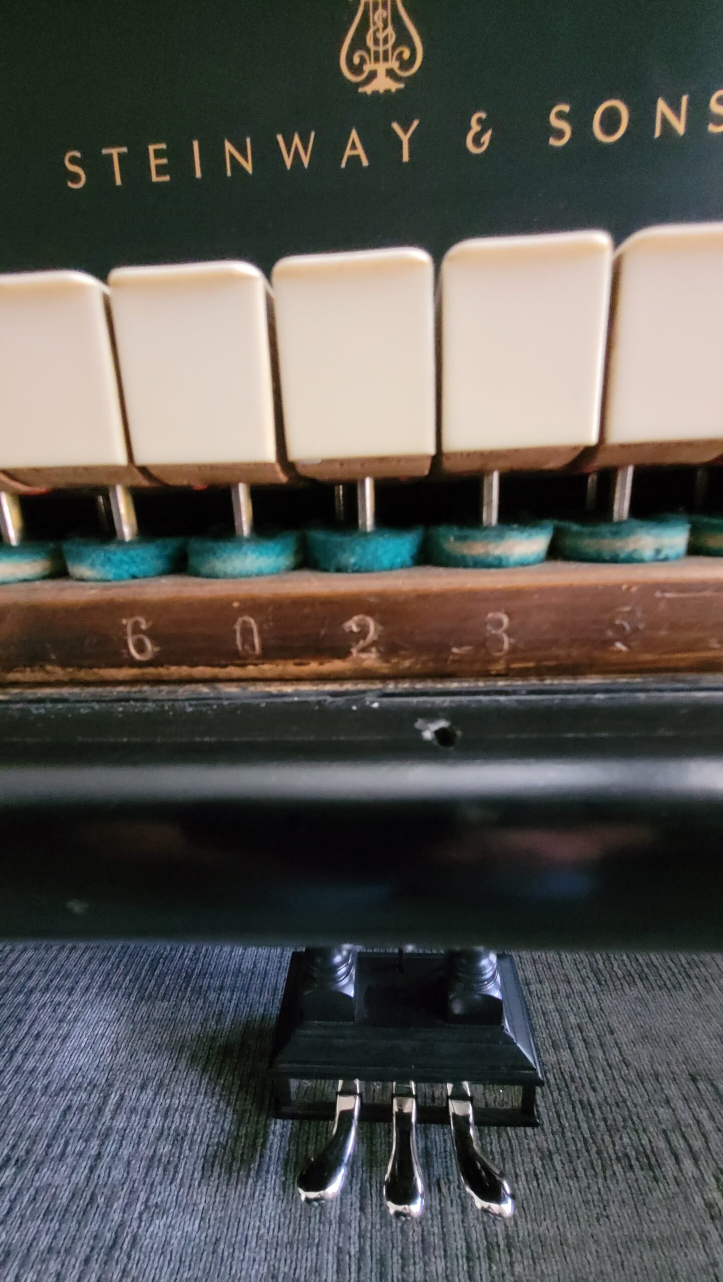 Steinway and Sons fallboard decal above original ivory keys
